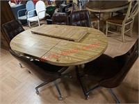 > dining table with 5 chairs on casters - approx