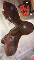 Leather English saddle with no stirrips or straps,