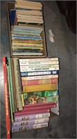 Two boxes of children’s books including Amber