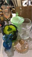 Group of modern glassware in a depression and