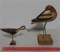 Two wooden shore birds