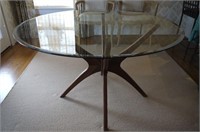 Teakwood dining table with glass top
