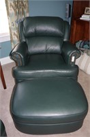 Leather upholstered chair and ottoman