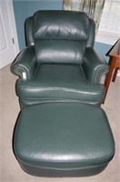 Leather upholstered chair and ottoman