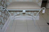Metal framed stool with upholstered seat