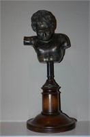 Bronze bust on Walnut stand