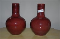 pair of Asian ox blood pottery vase