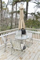 GLASS TOP TABLE WITH 4 CHAIRS AND UMBRELLA