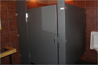 PRIVACY PARTITION LOCATED IN THE MENS BATHROOM;