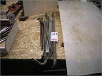 Assortment of wrecking bars, steel workers wrench