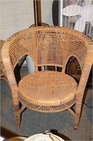 Tan wicker or bamboo chair and table