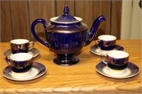 Cobalt blue Hall tea pot with 4 cups and saucers