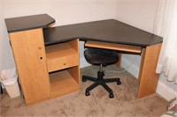 Computer desk with stool, twin bed and a white