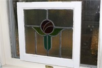 Panel of stained glass with small crack on the