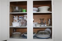 Contents of cabinet including soup bowls, Pyrex