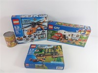 3 boîtes de jeux Lego City