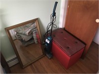 Hoover vacuum, mirror, and trunk