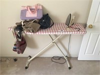 Ironing board, iron, and handbags