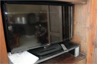 LG flatscreen and entertainment system