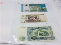 page with 3 foreign bank notes