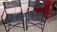 Two metal director chairs