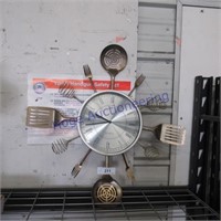 Clock made of utensils