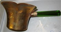 Brass server with green handle