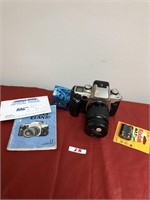 Canon Camera and Assorted Supplies