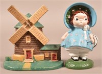 Cast Iron Windmill and Dolly Dimple Doorstop and