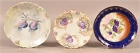 Three Porcelain Fruit Decorated Plates. Various