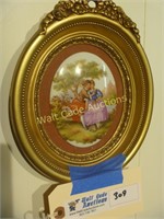 Guy and Girl Painting on Porcelain in Oval Frame