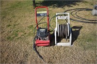 L- TROY BILT POWER WASHER AND HOSE REEL