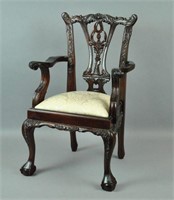 CHILD'S CHIPPENDALE-STYLE ARM CHAIR