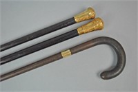 (2) GOLD FILLED WALKING STICKS AND A CANE
