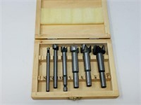 set of router bits in wood case