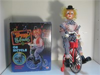 VINTAGE BATTERY-OPERATED CLOWN ON A  BIKE