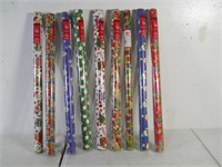 9 rolls brand new gift wrapping paper
