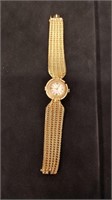 Vintage Invicta 18K gold women's watch