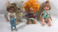 Group of dolls and Squeaking dog kids toy