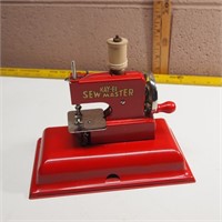 Working Child's Sewing Machine Tin Toy