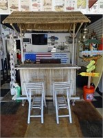 TIKI BAR WITH STOOLS AND TOTEM SIGN