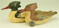 Pari of miniature carved Mergansers hen and