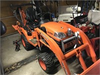 Kubota BX25D diesel four-wheel-drive tractor with