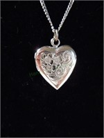 Sterling silver heart shaped locket and chain