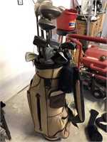 tan golf bag with assorted golf clubs
