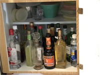 All decorative bottles in the cabinet