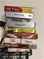 10 boxes of assorted golf balls