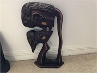 Hand Carved man & lady kissing
