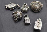STERLING COMPARTMENT JEWELRY: 5 PENDANTS AND 1