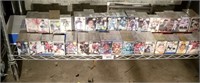Whole Shelf Of Hockey And Baseball Cards.